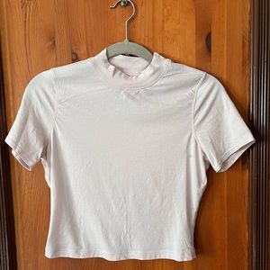 Light pink Lululemon cropped short sleeve workout top, size 6 or small